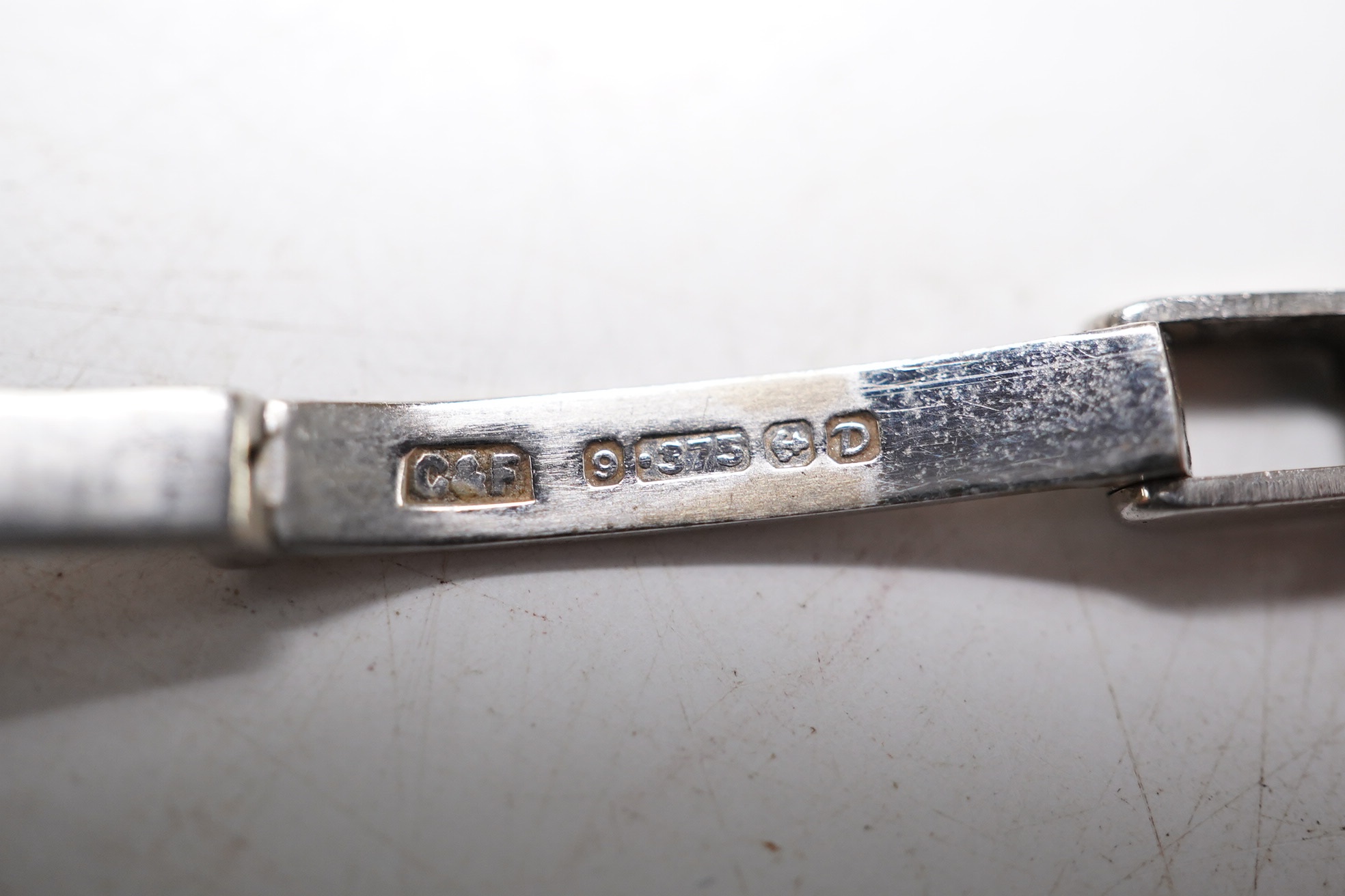 A lady's 1950's white metal and diamond cluster set manual wind cocktail watch, on a 9ct white gold bracelet, overall length 17.5cm, gross weight 17.1 grams. Condition - fair